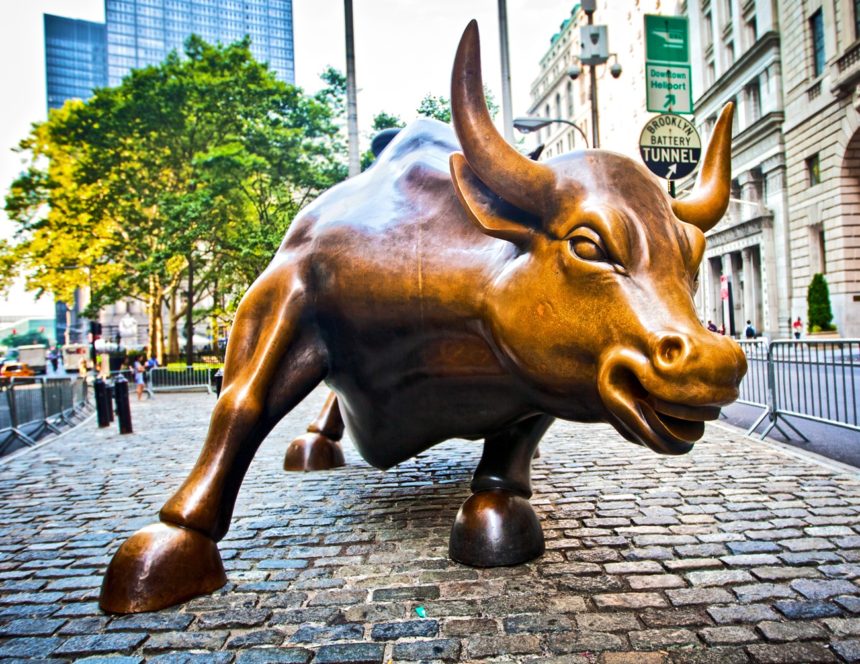 NEW YORK CITY - AUG 3: The landmark Charging Bull in Lower Manhattan represents aggressive financial optimism and prosperity August 3, 2012 in New York, NY. Breaking Down the Wall: How One Bill Could Finally Open Investment Doors Shut for Decades